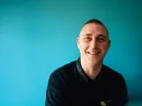 progress employee smiling for the camera