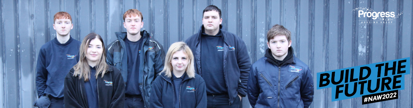 Mixed group of apprentices smiling
