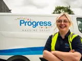 "image shows Alicia Apprentice Heating Engineer outside her van"