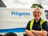 "image shows Alicia Apprentice Heating Engineer outside her van"